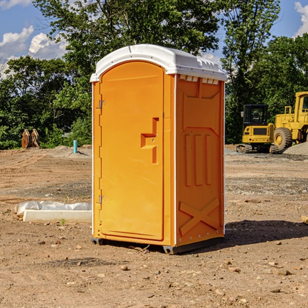 what is the cost difference between standard and deluxe portable restroom rentals in Caln